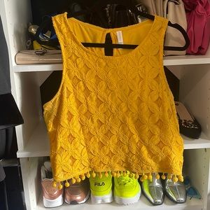 Yellow Xhiliration tank with poms